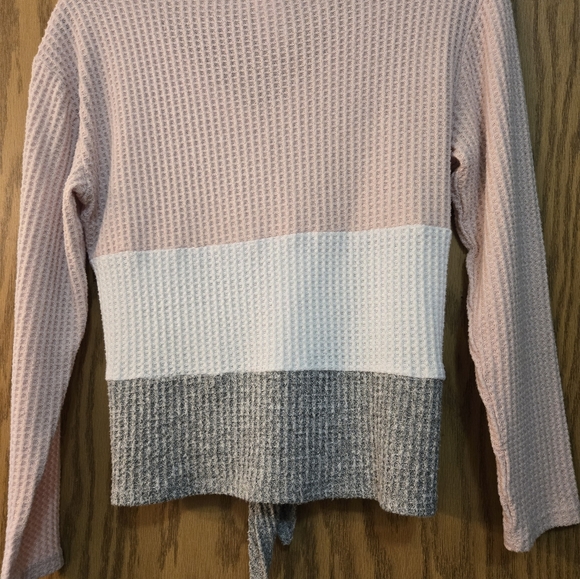 Cute light pink, white and gray, long sleeve blouse with buttons and front tie. - Picture 3 of 6